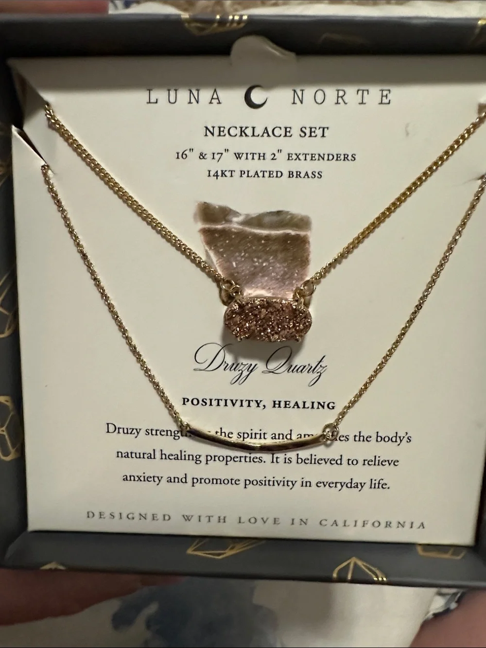 Luna Norte 14kt gold-plated brass layered necklace set features a sparkling